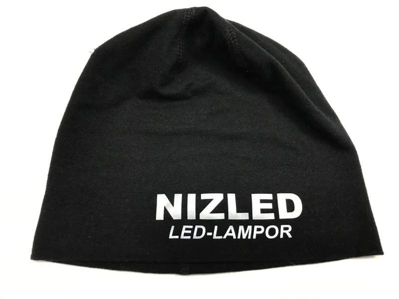 Nizled mössa med reflextryck